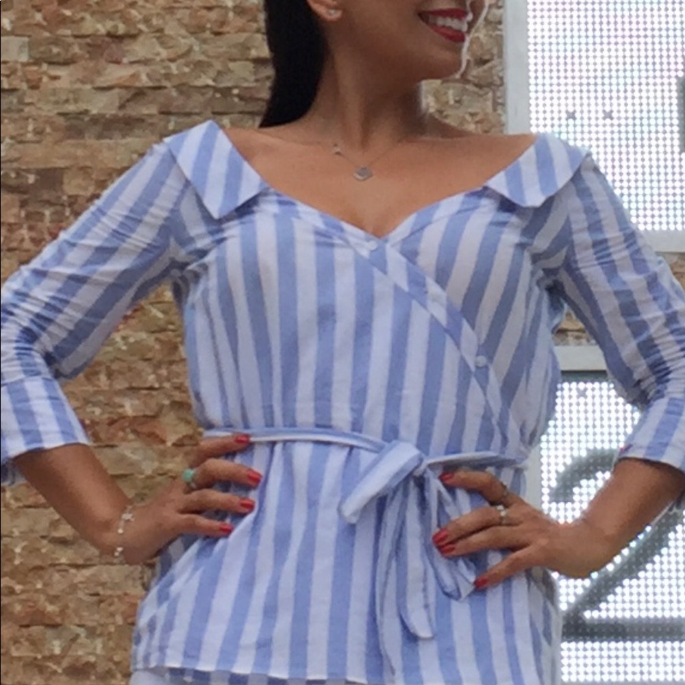Crossed off to shoulder blouse